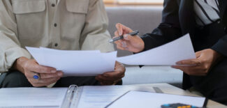 two people going over paperwork