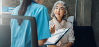 Female doctor talking to a patient