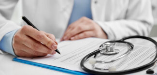 Woman practitioner in uniform prescribing recipe for medical treatment.